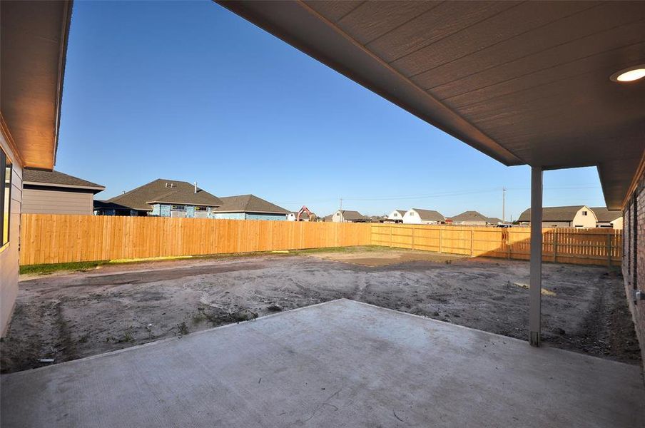 Breezeway from garage to rear door of the home, stay dry, stay cool.