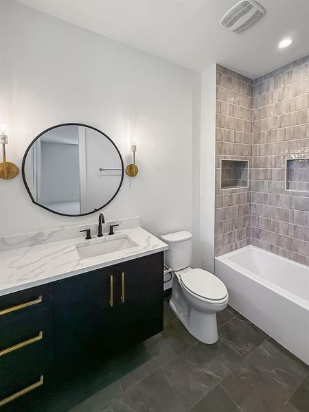 Bathroom with vanity and washtub / shower combination Bathroom with vanity and washtub / shower combination