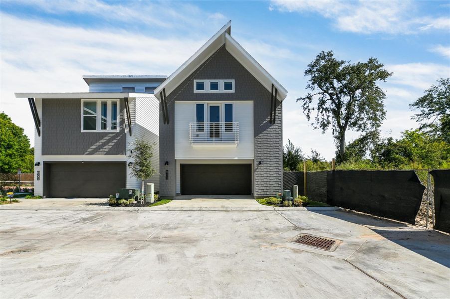 Front exterior of a new home in , Houston, TX, highlighting curb appeal (Image 1).