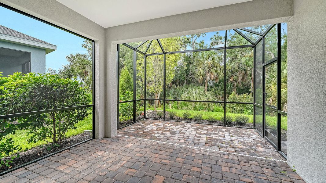 Exterior details and patio area of a home in Wildleaf Real Estate and Homes for Sale in Parrish, FL - Neal Communities, Parrish (Image 20). Exterior details and patio area of a home in Wildleaf Real Estate and Homes for Sale in Parrish, FL - Neal Communities, Parrish (Image 20).