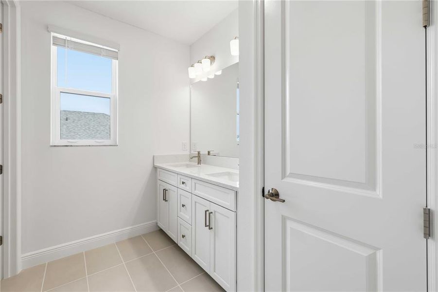 Furnished interior view inside a new home in Creeks Edge at Twin Rivers, Parrish (Image 40).