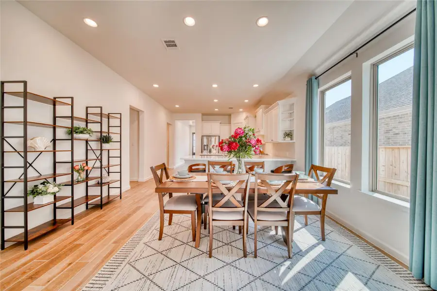 Furnished interior view inside a new home in Meridiana 40'/45', Manvel (Image 13).