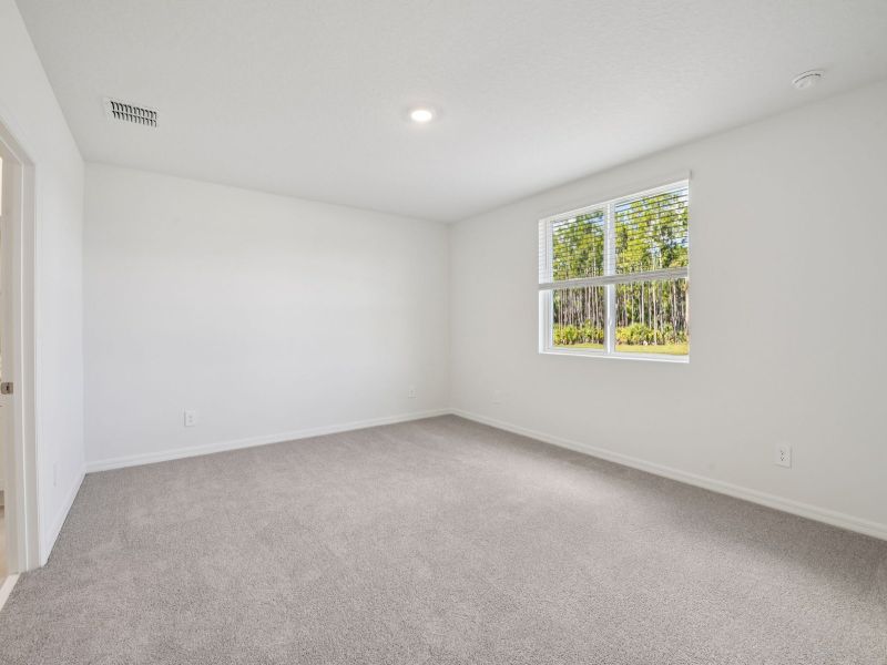 Spacious, unfurnished interior of a new home in Ridgehaven - Villas, Ormond Beach (Image 8).