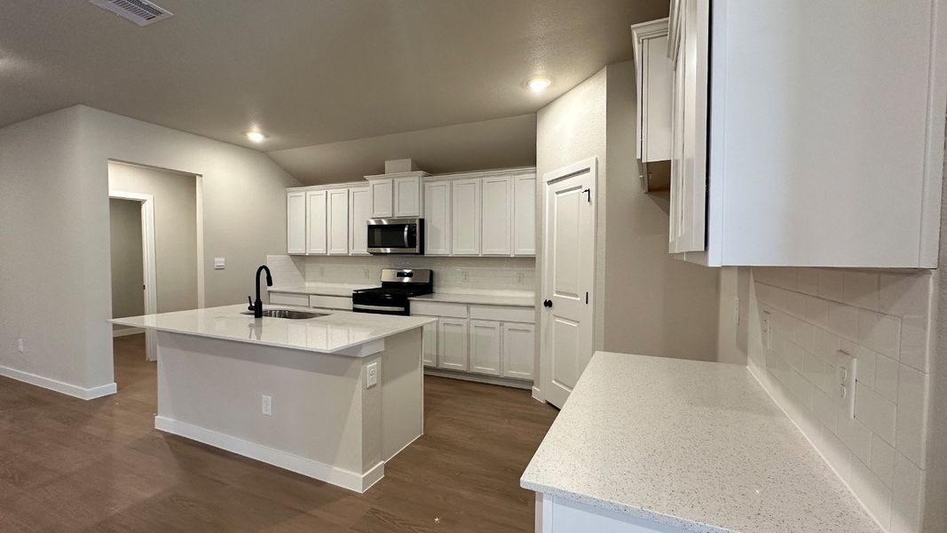 Furnished interior view inside a new home in The Lakes Northwest, Robstown (Image 11).