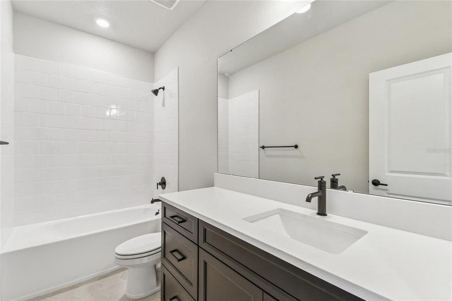 Furnished interior view inside a new home in John’s Lake North, Clermont (Image 6).