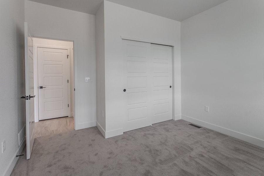Spacious, unfurnished interior of a new home in Prairie Song, Windsor (Image 38).