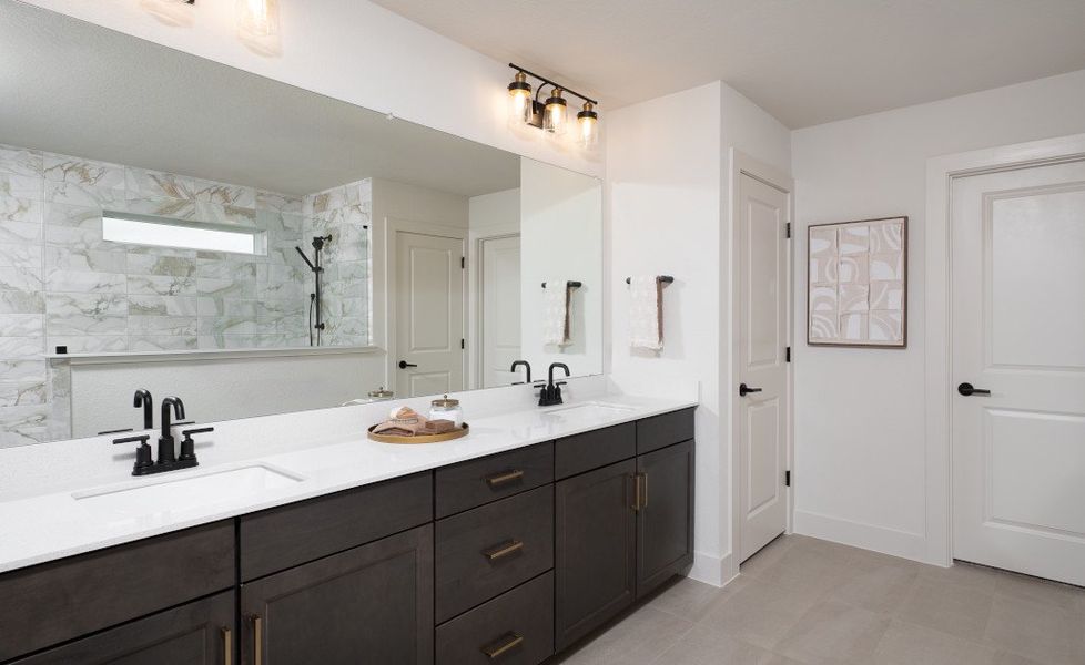 Representative furnished interior of a home built from the Colton by Ashton Woods in Covered Bridge, Hutto (Image 9).