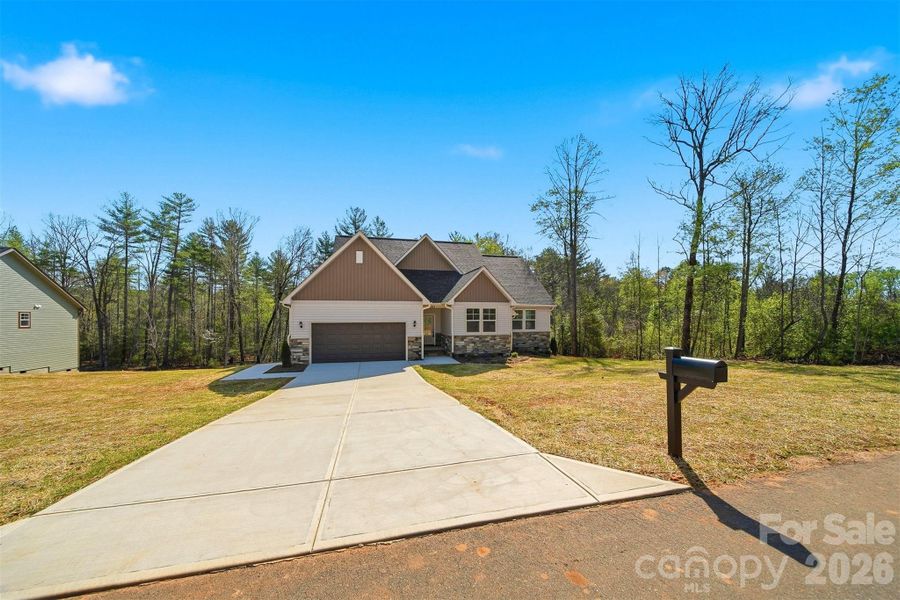 Front exterior of a new home in , Morganton, NC, highlighting curb appeal (Image 25).