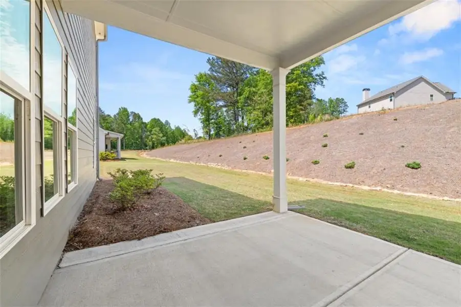 Exterior details and patio area of a home in Traditions of Braselton, Jefferson (Image 4). Exterior details and patio area of a home in Traditions of Braselton, Jefferson (Image 4).