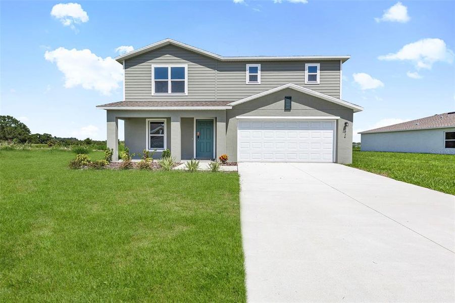 Front exterior of a new home in Scenic Terrace, Haines City, FL, highlighting curb appeal (Image 6).