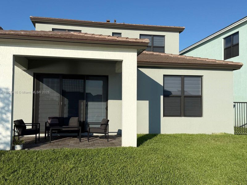 Front exterior of a new home in , Westlake, FL, highlighting curb appeal (Image 21).