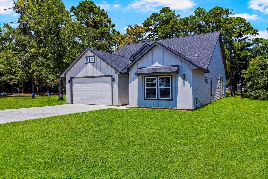 Front exterior of a new home in , Onalaska, TX, highlighting curb appeal (Image 1). Front exterior of a new home in , Onalaska, TX, highlighting curb appeal (Image 1).