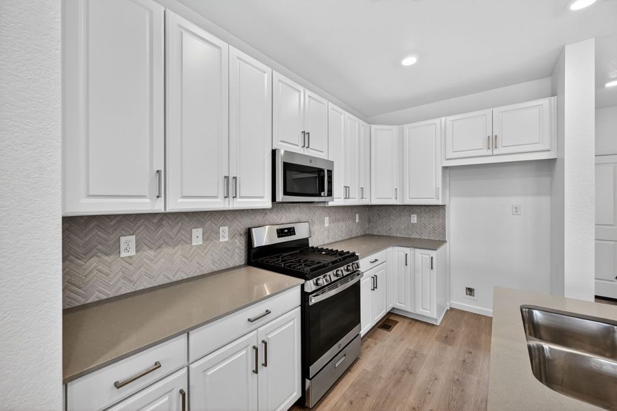 Furnished interior view inside a new home in Parterre, Thornton (Image 3).