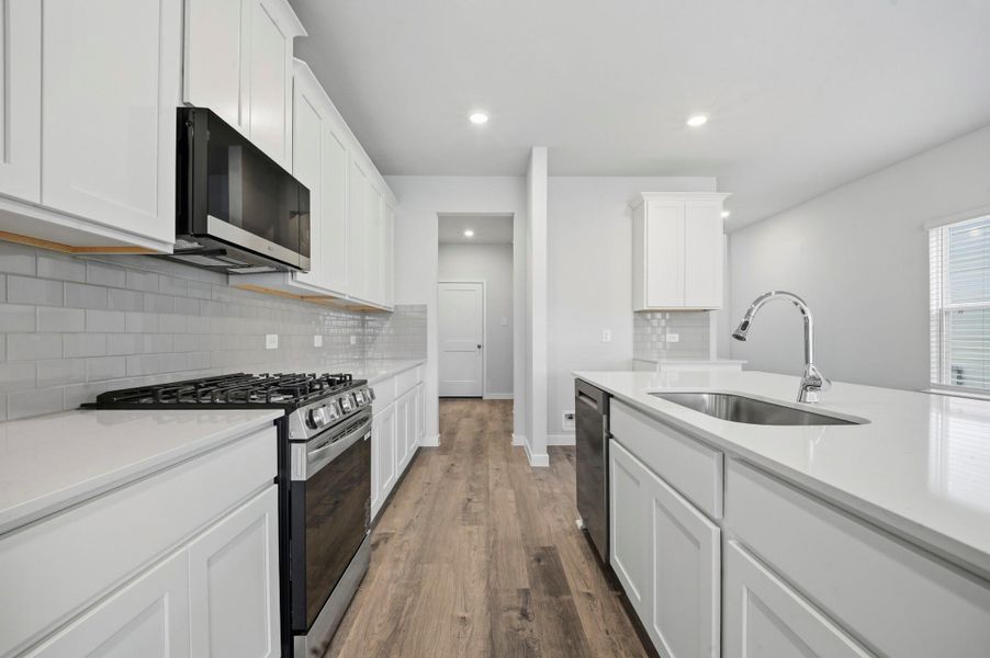 Furnished interior view inside a new home in Barrett Crossing, Crosby (Image 11).