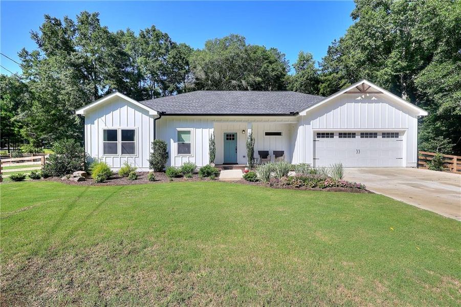 Front exterior of a new home in , Monroe, GA, highlighting curb appeal (Image 1). Front exterior of a new home in , Monroe, GA, highlighting curb appeal (Image 1).