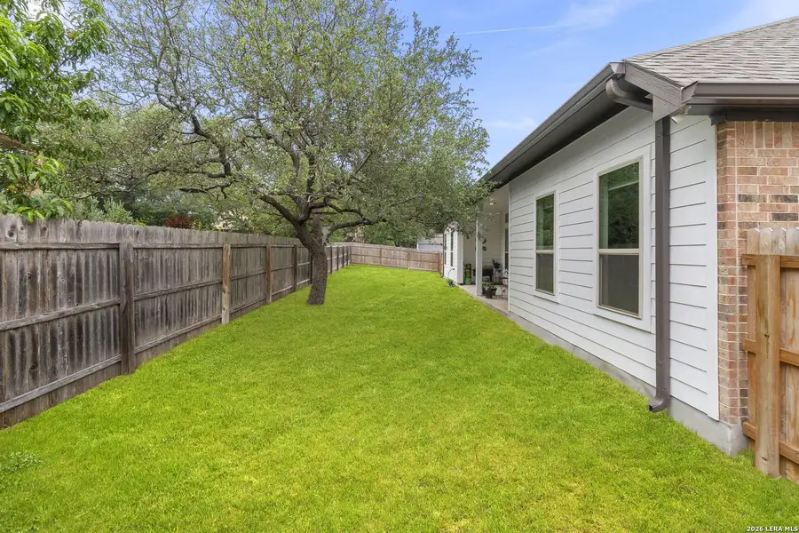 Exterior details and patio area of a home in Elkhorn Ridge, Boerne (Image 24).
