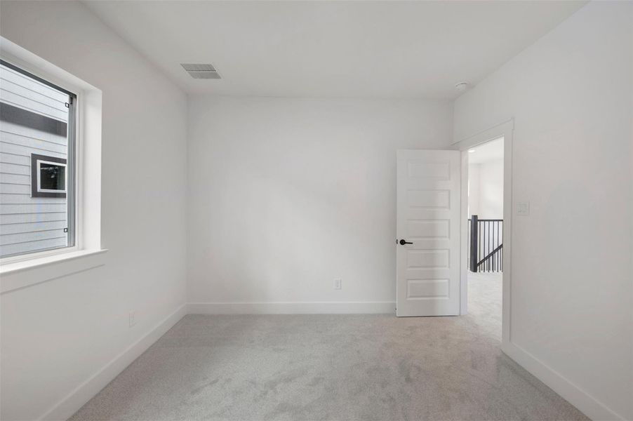 Spacious, unfurnished interior of a new home in Two Step Farm - Cottages Row Collection, Montgomery (Image 20).