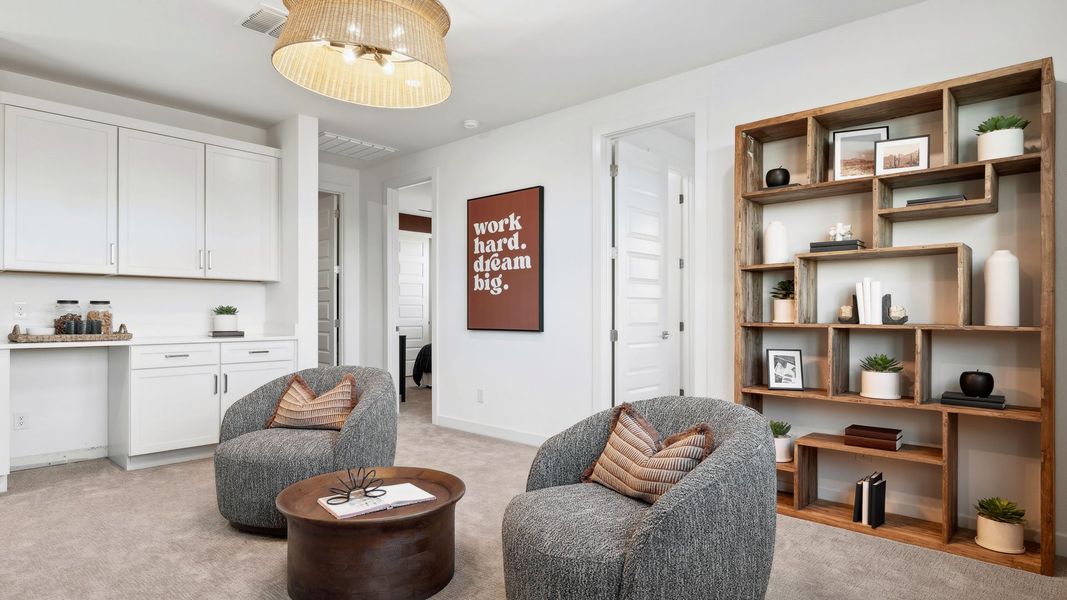 Representative furnished interior of a home built from the Miraval by D.R. Horton in The Ridge at Stone Butte, Phoenix (Image 35).
