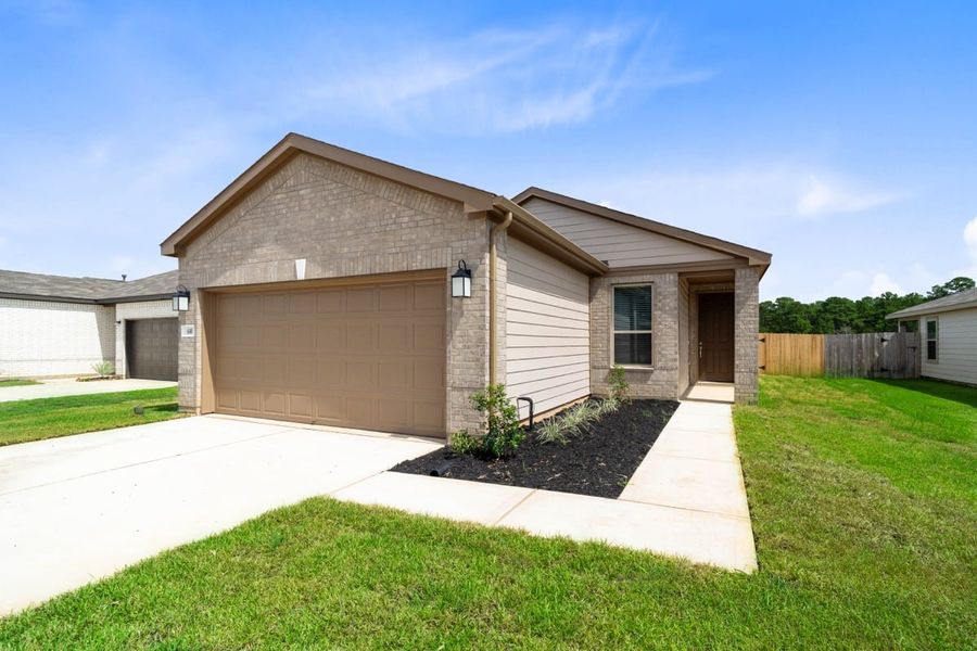 Front exterior of a new home in Mustang Ridge, Magnolia, TX, highlighting curb appeal (Image 16).