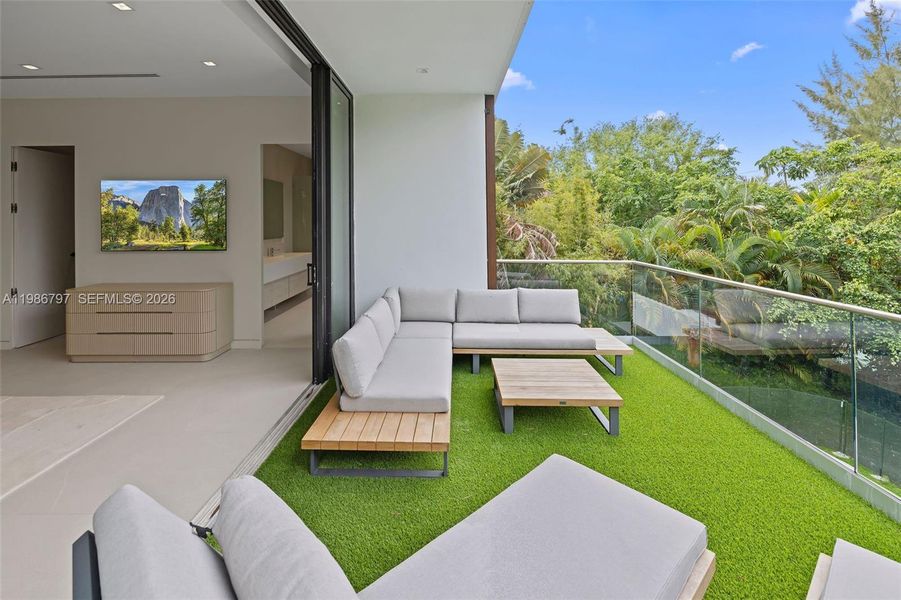Primary Balcony Overlooking Pool
