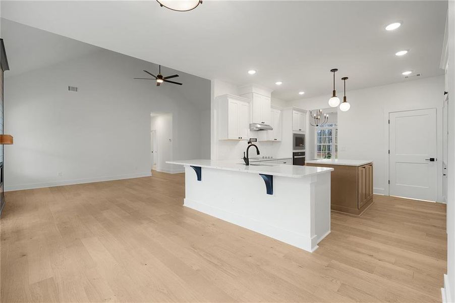 Furnished interior view inside a new home in , White (Image 9).