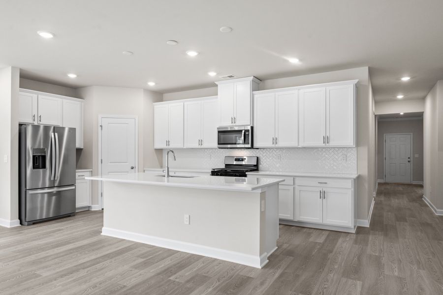 Furnished interior view inside a new home in Cypress Ridge - The Coastline Series, Longs (Image 4).