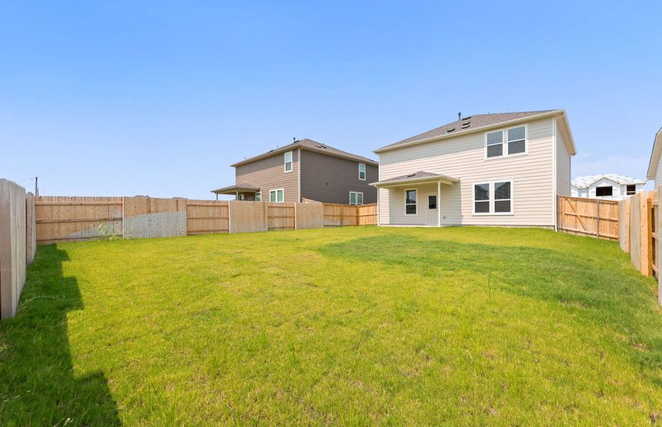 Exterior details and patio area of a home in Patterson Ranch, Georgetown (Image 4).