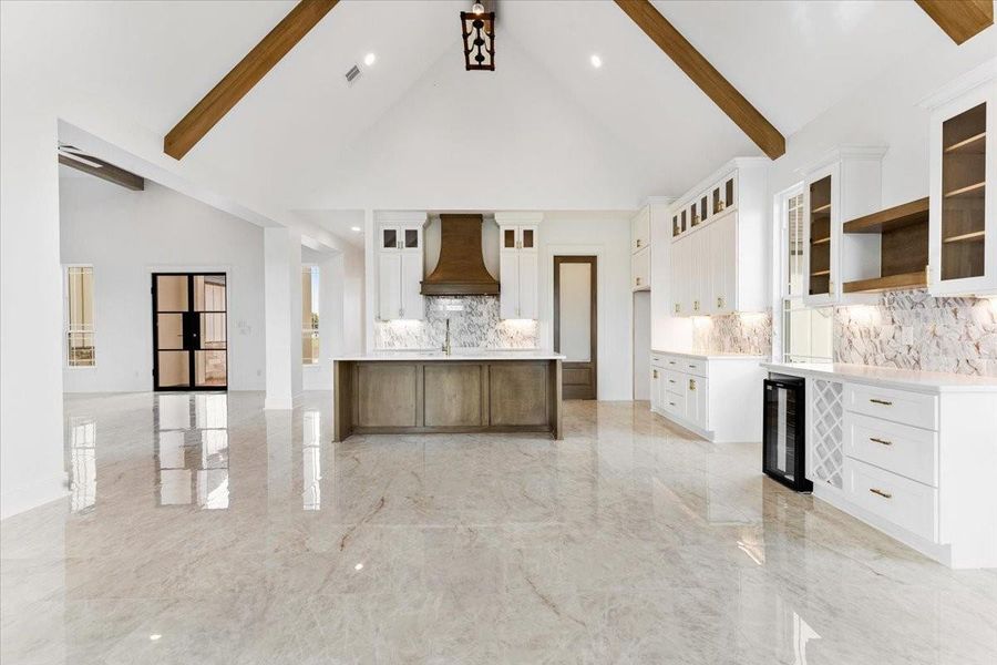 Open-concept living and kitchen area perfect for everyday living and entertaining. Open-concept living and kitchen area perfect for everyday living and entertaining.