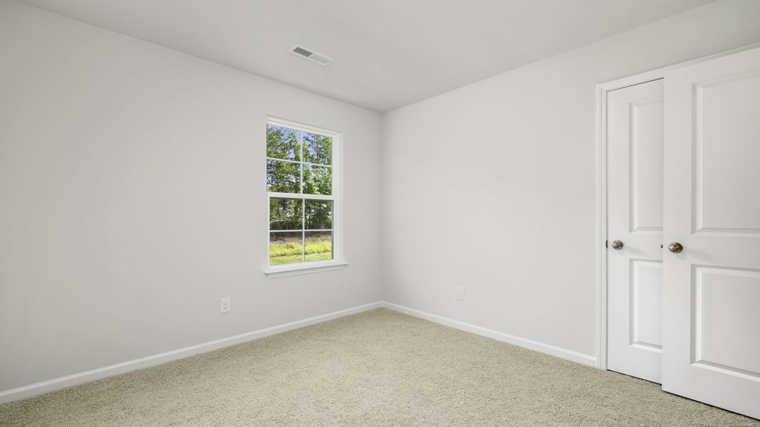 Spacious, unfurnished interior of a new home in Greystone North, Stoneville (Image 17).