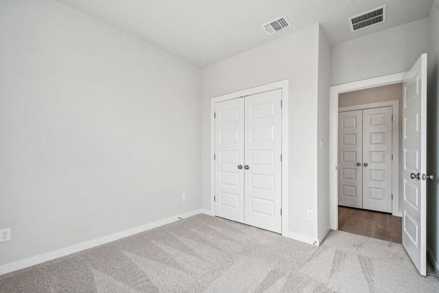 Spacious, unfurnished interior of a new home in Avery Centre, Round Rock (Image 24).