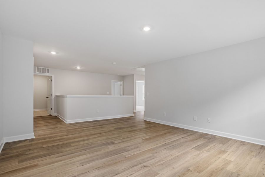 Spacious, unfurnished interior of a new home in Georgias Landing, Raleigh (Image 31).