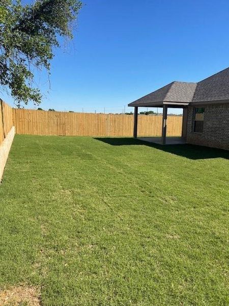 Exterior details and patio area of a home in , Springtown (Image 3).