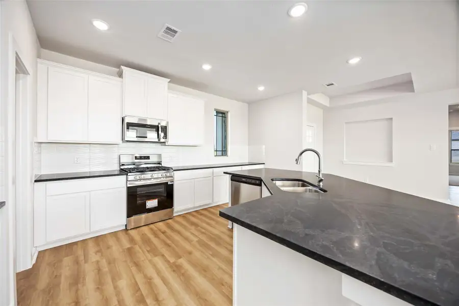 Furnished interior view inside a new home in Blue Heron Estates, Beasley (Image 7). Furnished interior view inside a new home in Blue Heron Estates, Beasley (Image 7).