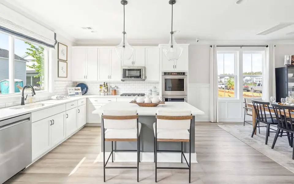 Representative furnished interior of a home built from the Aiden by Brookfield Residential in Wendell Falls, Wendell (Image 4).
