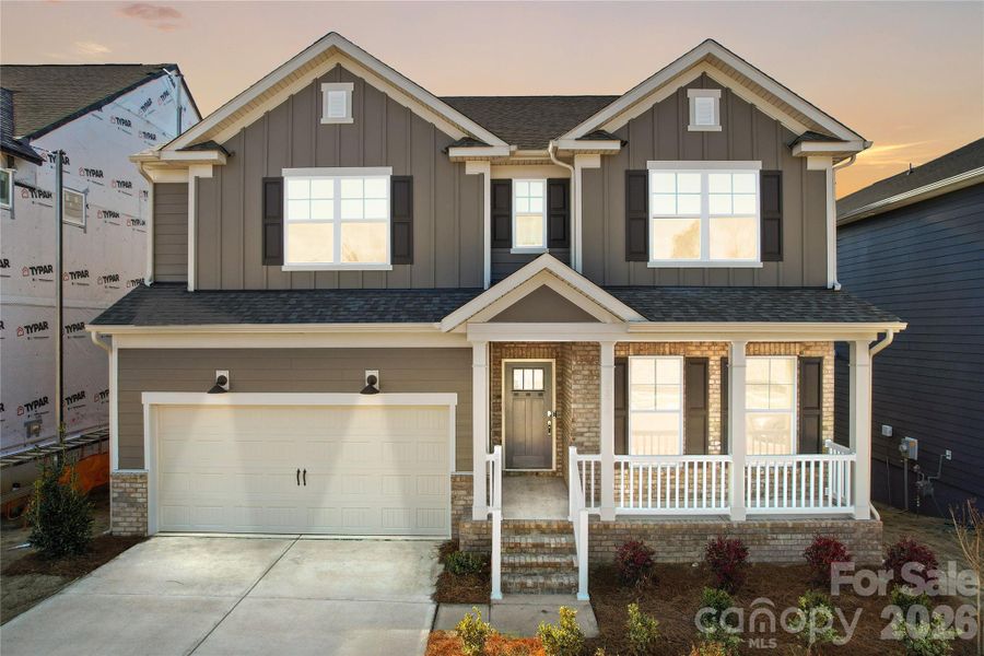 Front exterior of a new home in Cannon Run, Concord, NC, highlighting curb appeal (Image 22).