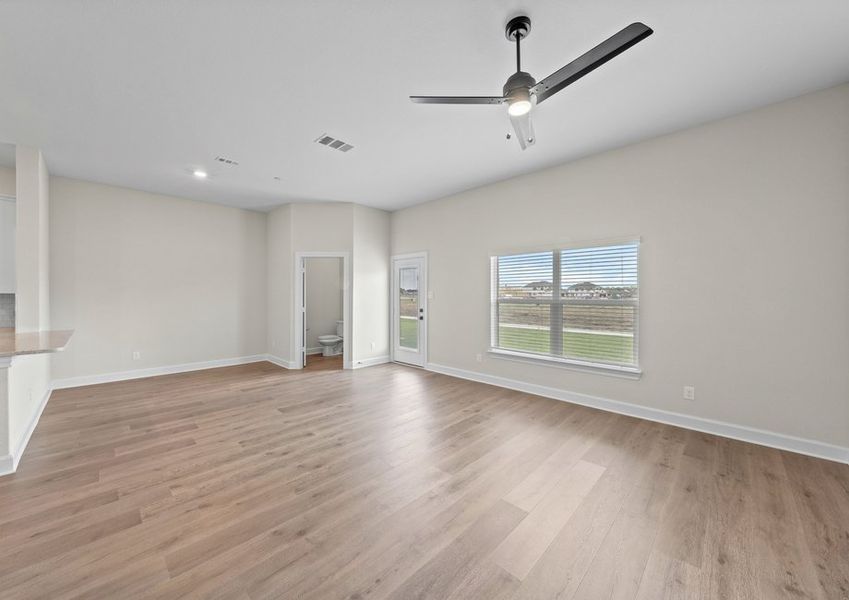 The family room has a large window that lets in great, natural light.