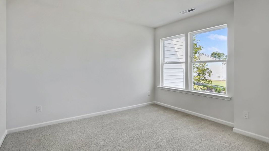Spacious, unfurnished interior of a new home in Copper Run South, Durham (Image 21).