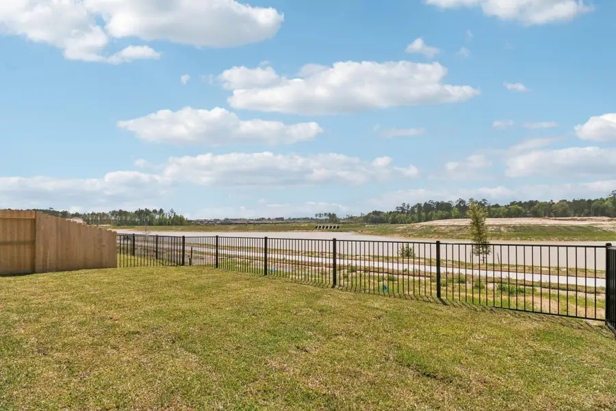 Exterior details and patio area of a home in , Conroe (Image 3). Exterior details and patio area of a home in , Conroe (Image 3).