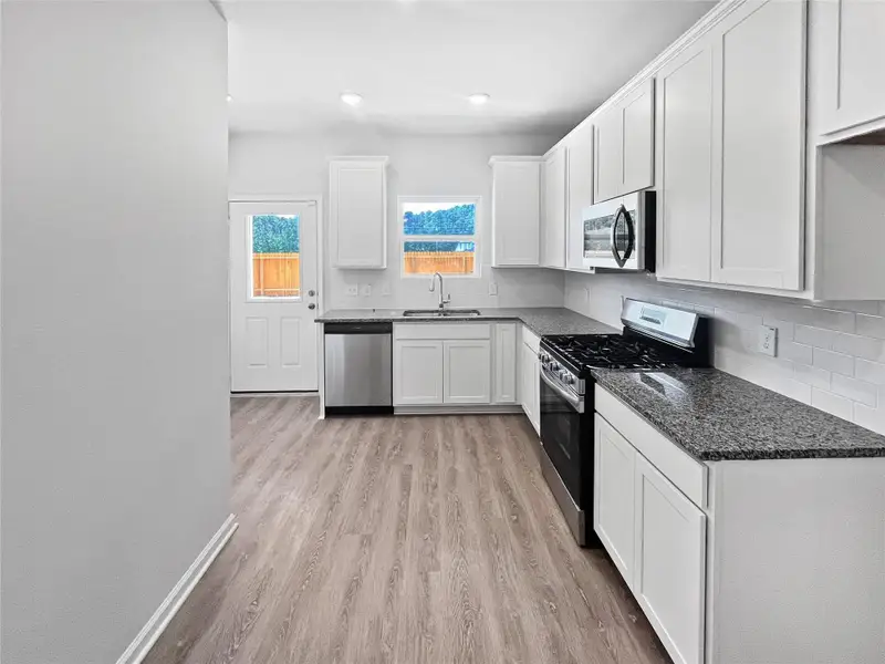 The Blue Jay II- Kitchen. Home under construction, photo used for illustrative purposes only, colors and options will vary.