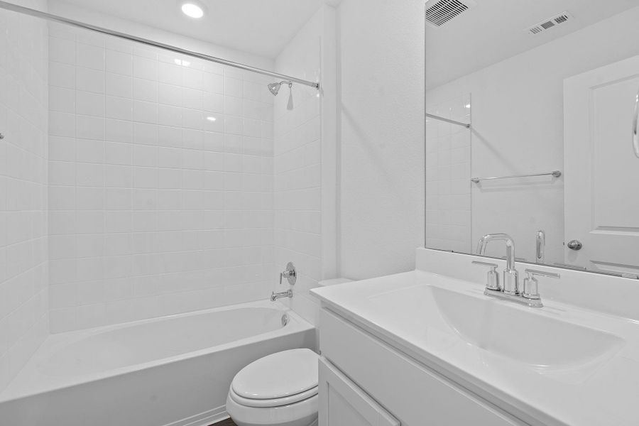Bathroom with vanity and shower / washtub combination Bathroom with vanity and shower / washtub combination