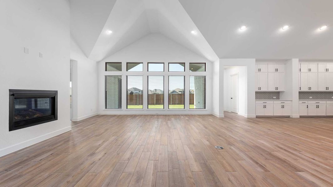 Representative unfurnished interior of a home built from the 4411W by Perry Homes in Enchanted Creek, Allen (Image 15).