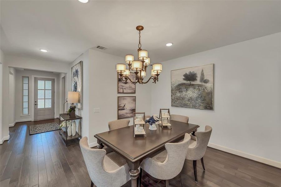 Representative Photo. Views of formal dining room and beautiful foyer space