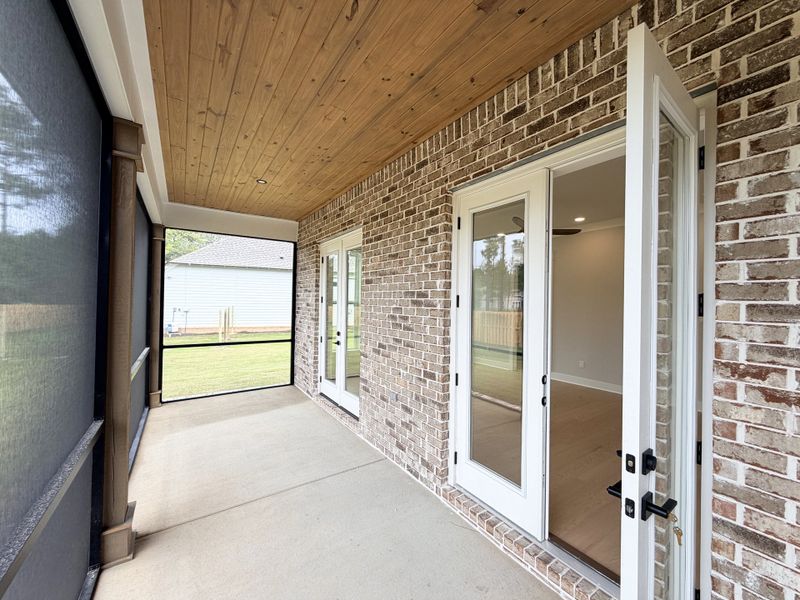 Exterior details and patio area of a home in Steamboat Landing at Hammock Bay, Freeport (Image 3).