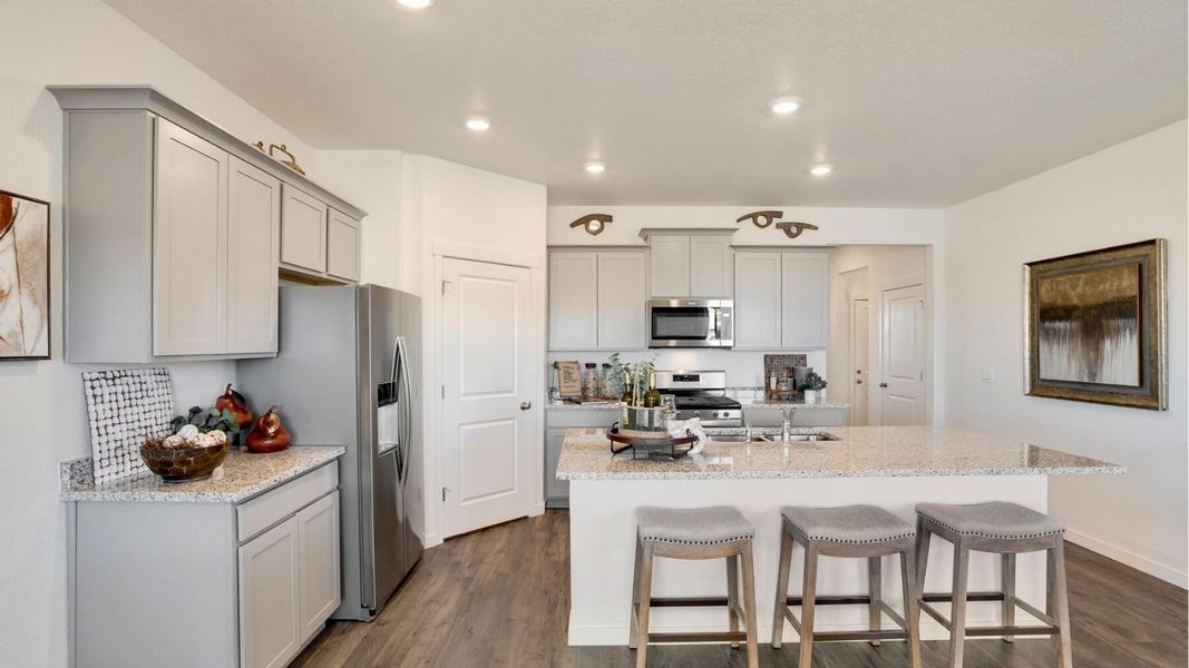Representative furnished interior of a home built from the Chatham by D.R. Horton in Sky Ranch, Watkins (Image 8). Representative furnished interior of a home built from the Chatham by D.R. Horton in Sky Ranch, Watkins (Image 8).