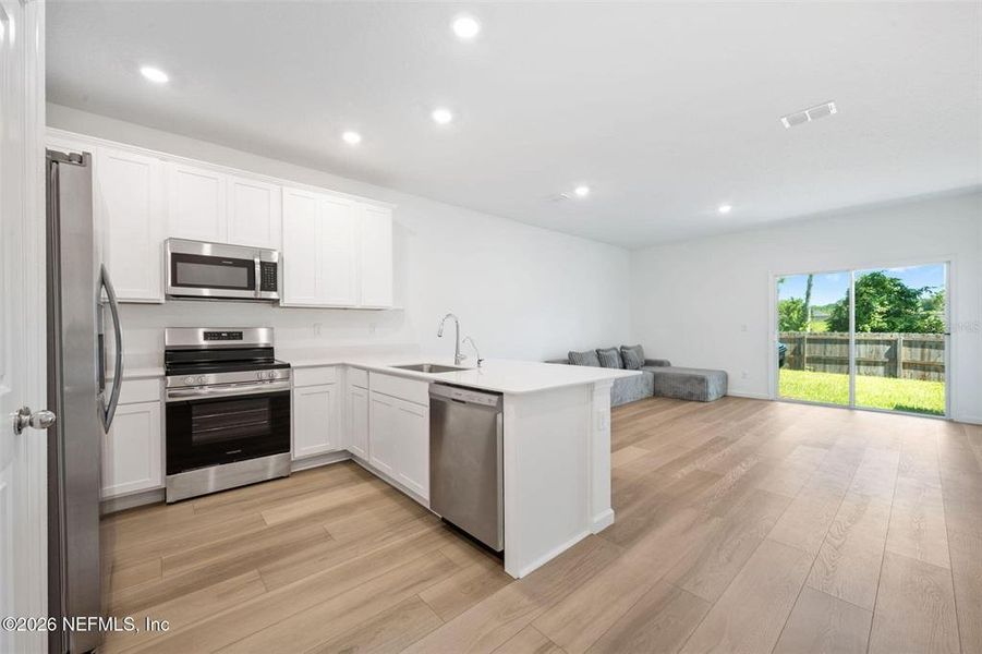 Furnished interior view inside a new home in , Orange Park (Image 5).