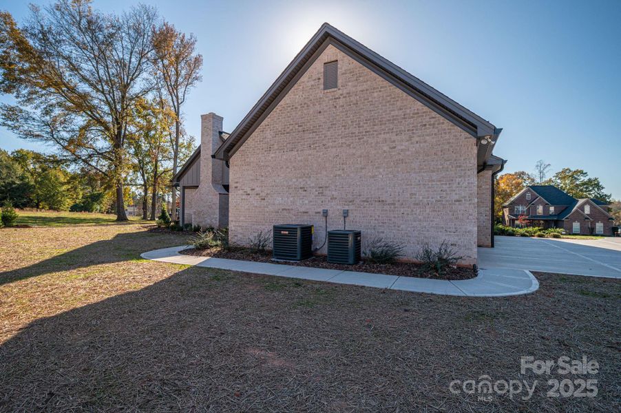 Exterior details and patio area of a home in , Belmont (Image 32).