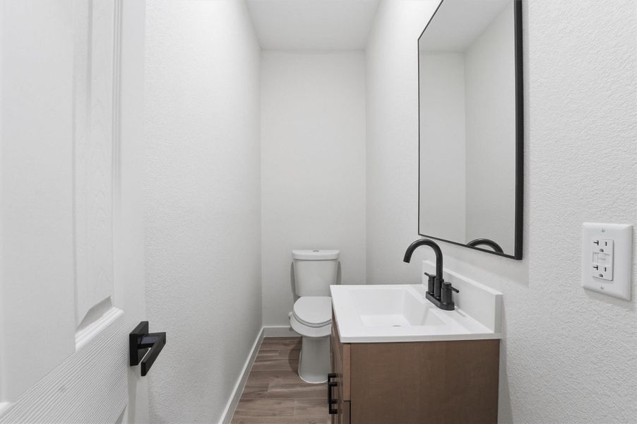 Furnished interior view inside a new home in , Conroe (Image 11).