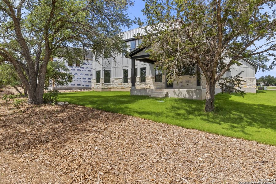Exterior details and patio area of a home in , Wimberley (Image 10).