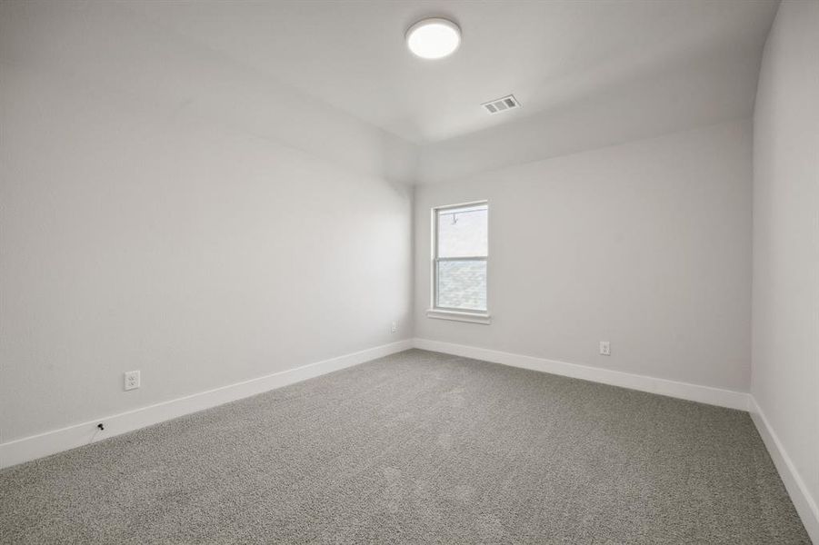 Spare room with carpet