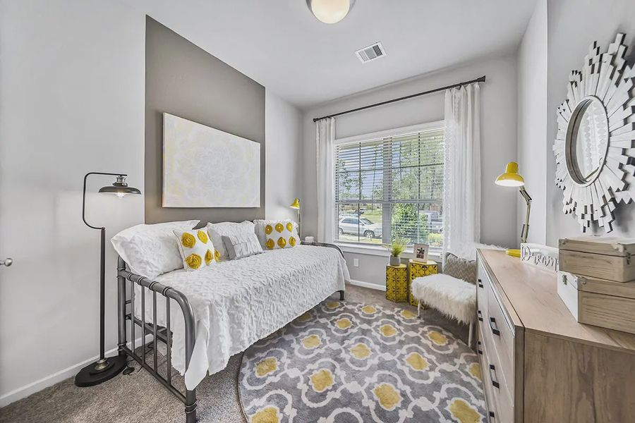 Representative furnished interior of a home built from the Marshall by Chesmar Homes in Stream Waters, Buda (Image 9).